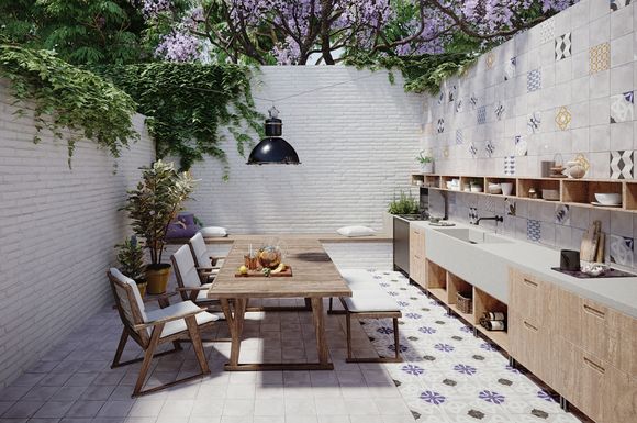 Outdoor-Küchen sind ideal für alle, die gerne und oft Gäste auf der Terrasse empfangen. Feinsteinzeugfliesen im Retro-Look sorgen nicht nur für Flair, sondern sind absolut pflegeleicht.
